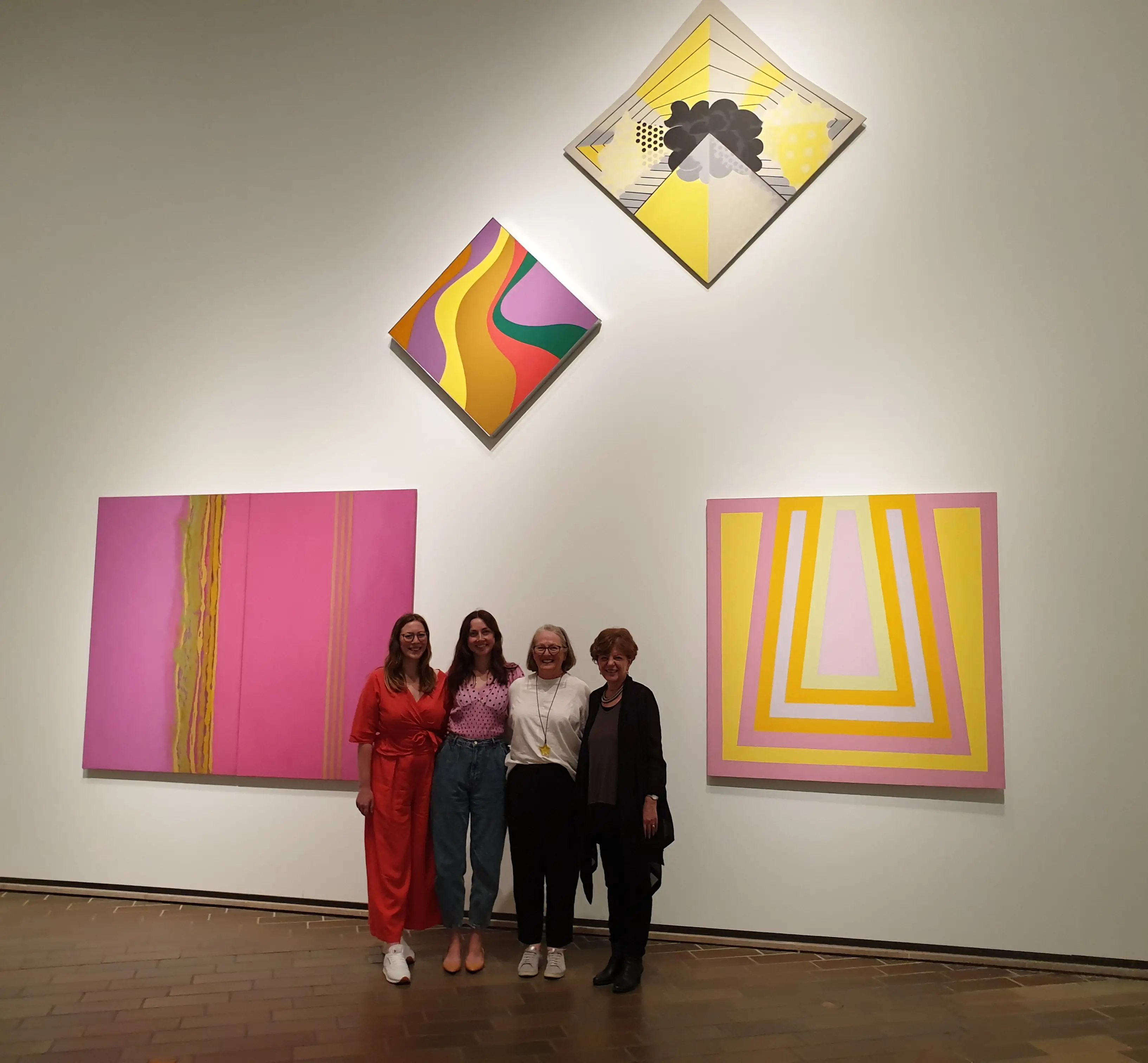 'Sukhavati No. 5' by Margret Worth in the exhibition 'Know My Name'.Curators R to L: Dr. Deborah Hart, (artist MW), Elspeth Pitt, Yvette Dal Pozzo beneath 'Sukhavati No. 5' in the exhibition of Australian women artists 1900 to 2020